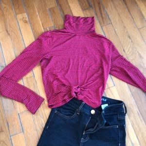 Red and black turtleneck top